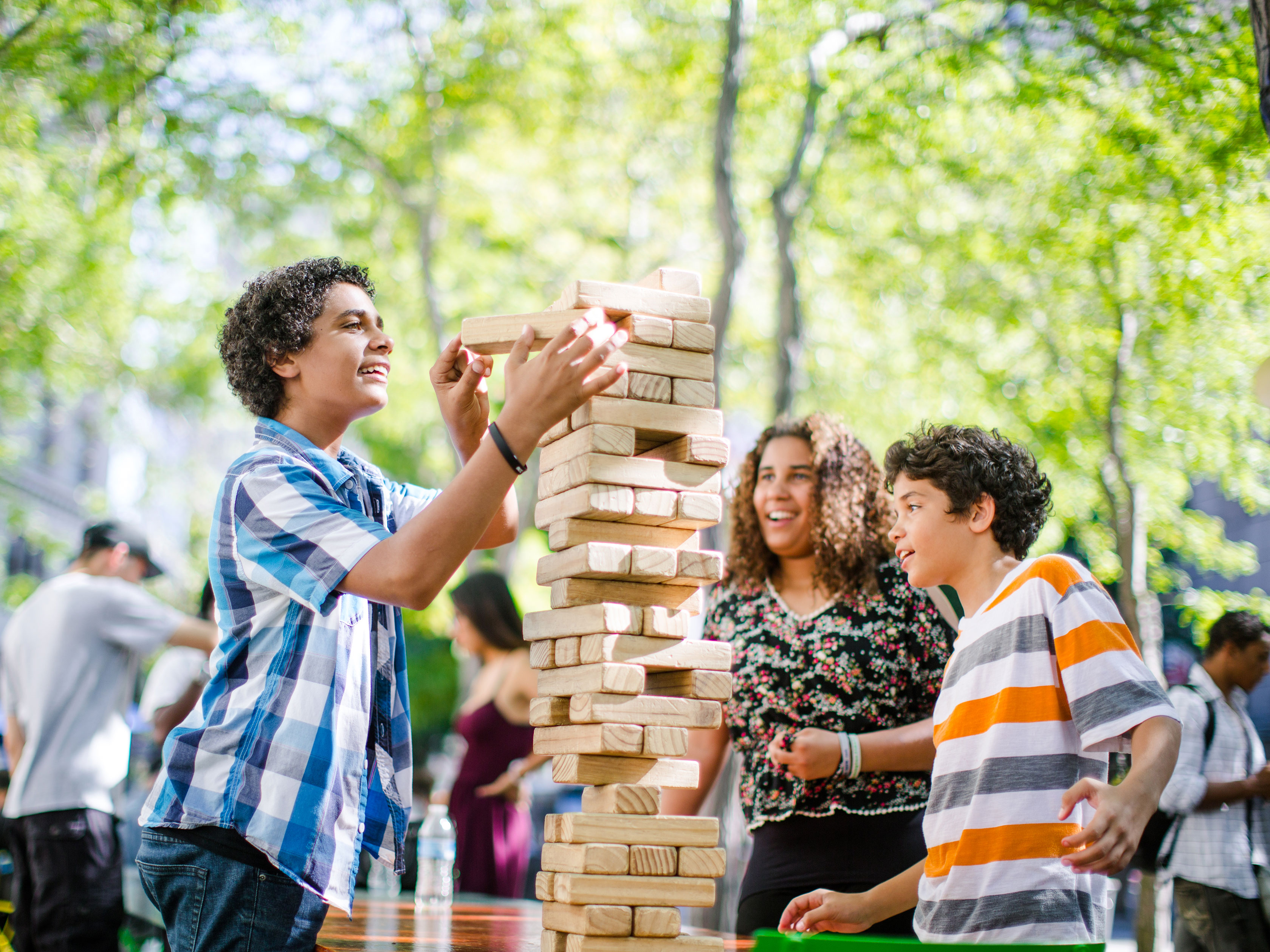 Young people playing Jenga in Westlake Park