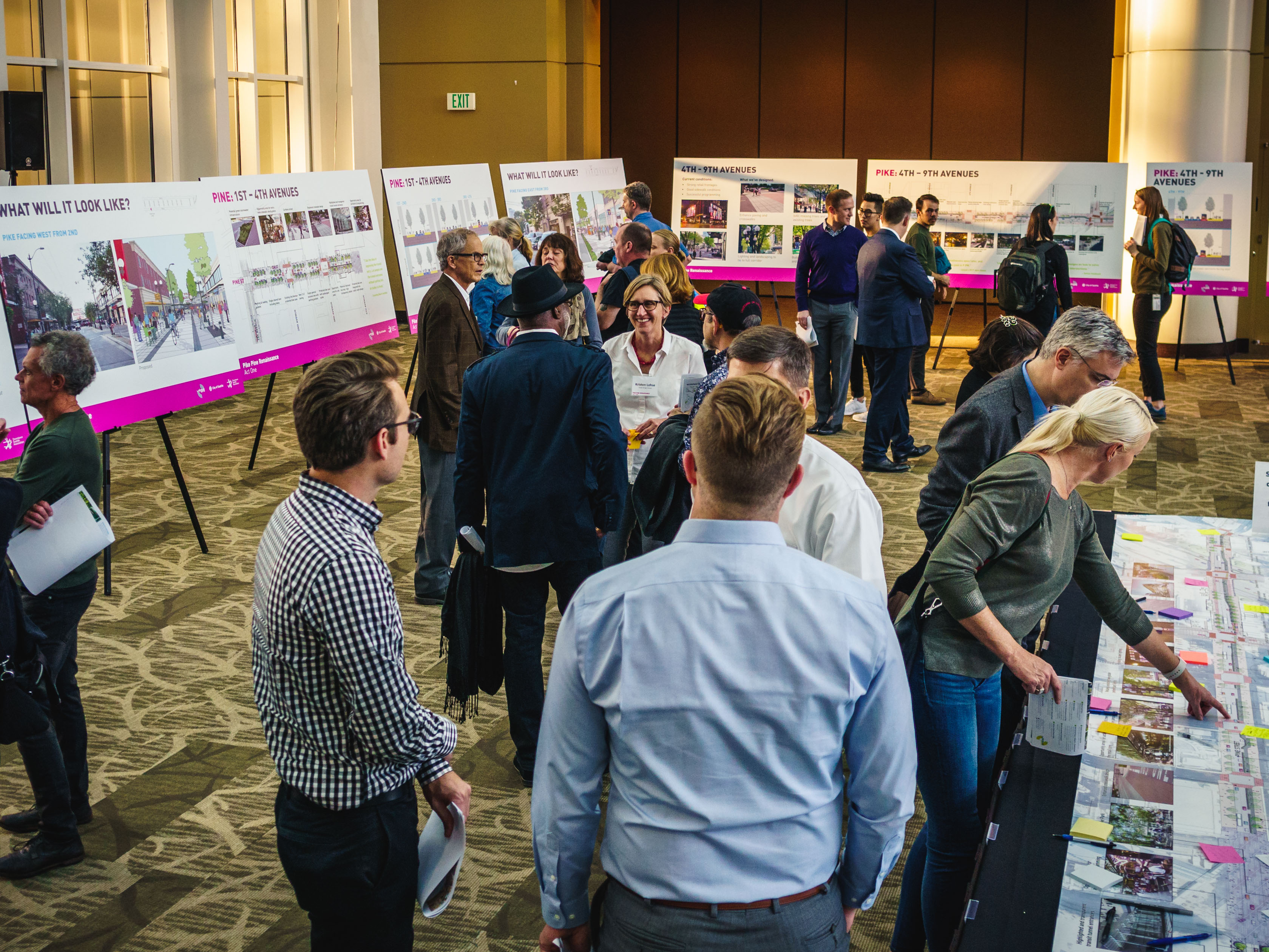 People gathering to learn about the Pike Pine Renaissance at the Washington State Convention Center