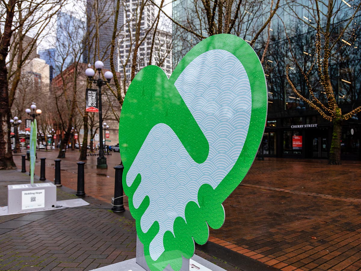 Holding Hope sculpture in Occidental Square