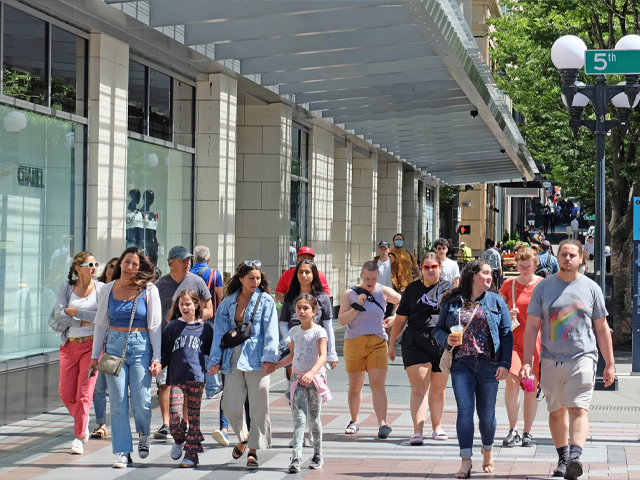 Crowd on downtown sidewalk