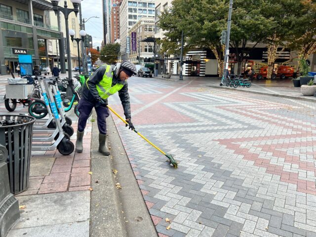Clean Team ambassador sweeping