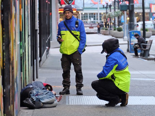 Downtown Ambassadors helping someone