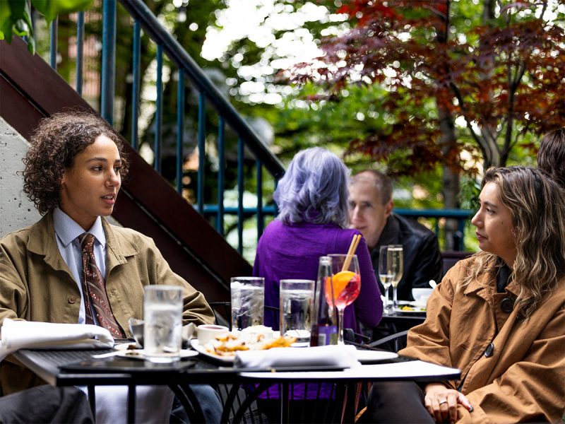 People enjoying dinner outside at Zig Zag Cafe in downtown Seattle