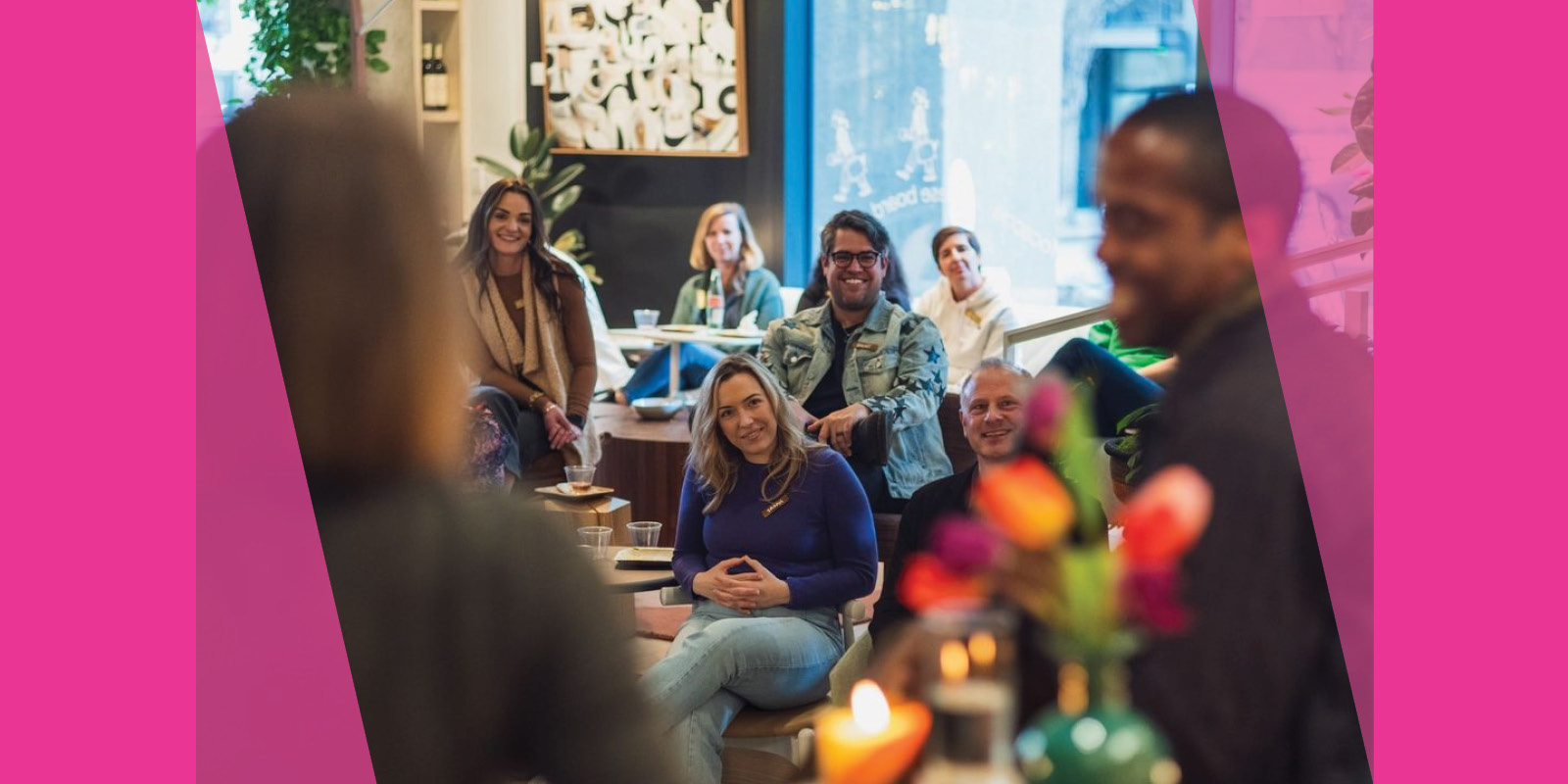 People sitting and smiling.