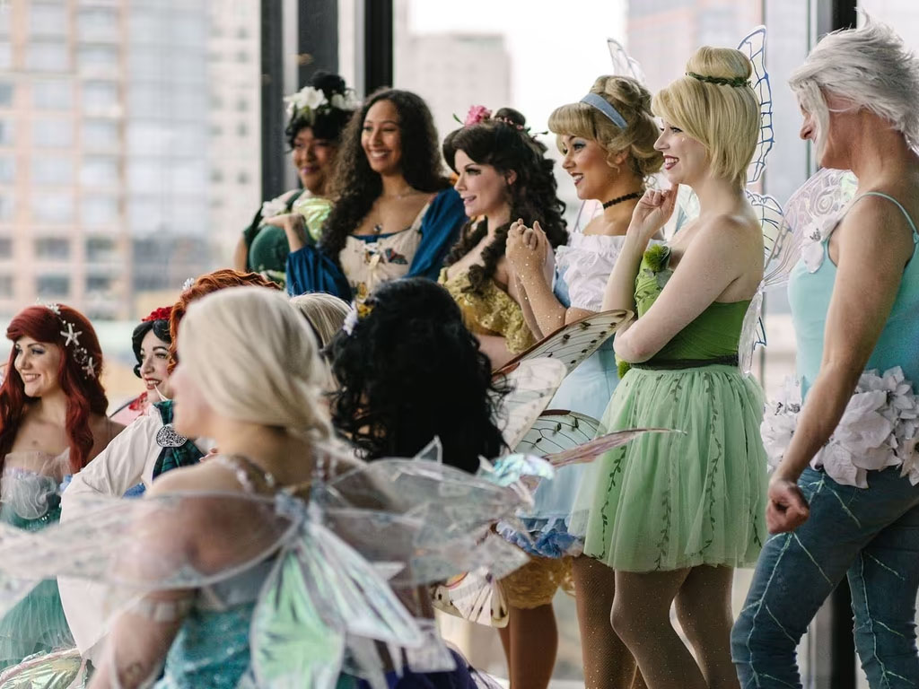 Comic Con attendees in costume posing for a photo at the Seattle Convention Center