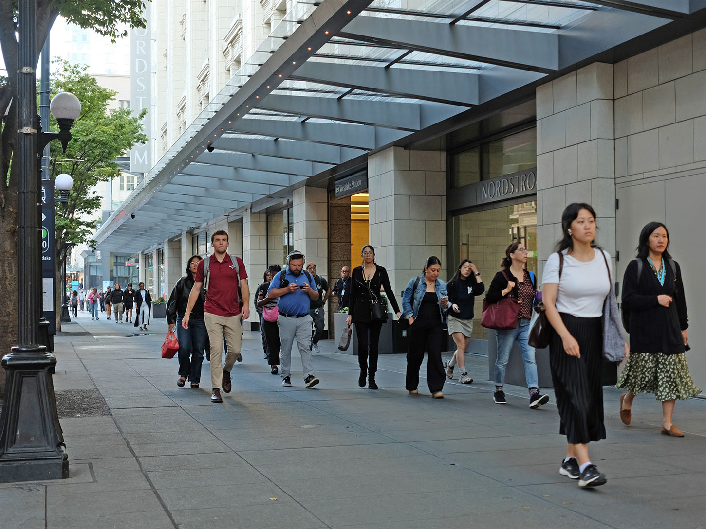 Pedestrians outside of Norsdstrom in downtown Seattle