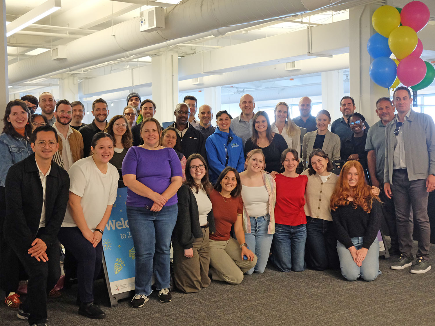 Staff smiling in new office space