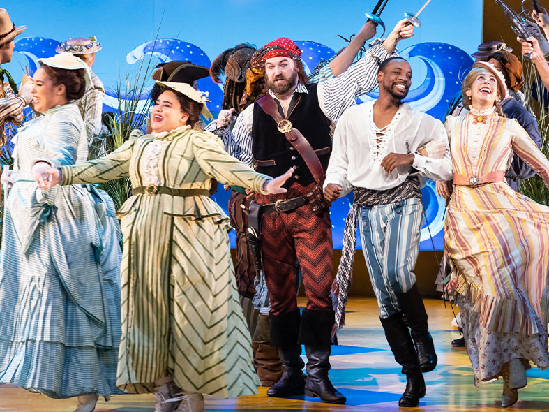 Cast of Pirates of Penzance on stage