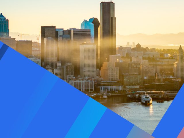 Cityscape of Seattle waterfront at dawn, surrounded by angled blue color bars