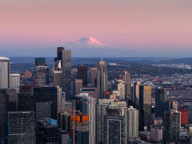 Seattle cityscape and mountain at sunset